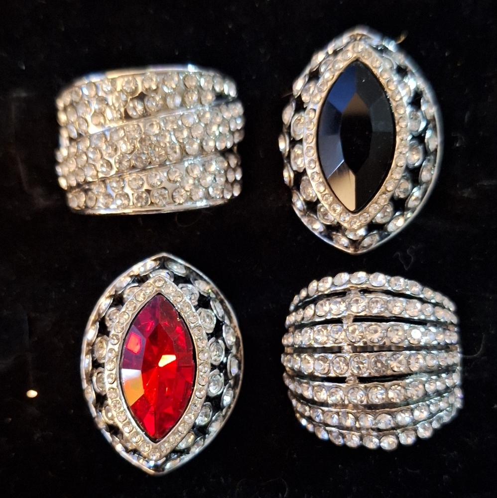 NEW WOMEN'S RHINESTONE RINGS LOT OF 4-  One Size Fits All... BLING BLING